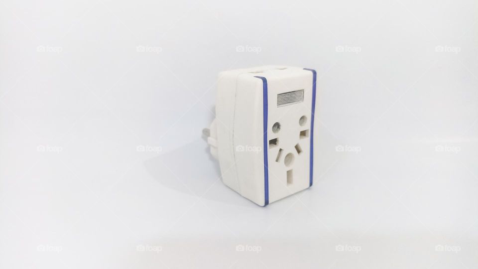 Electrical socket terminal on isolated white background in eye level view