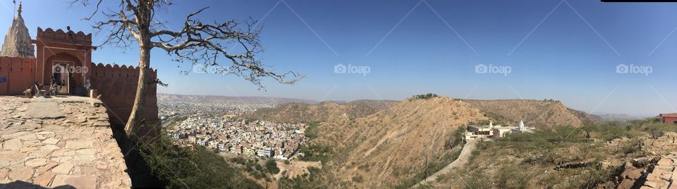 Small city surrounded by natural hills