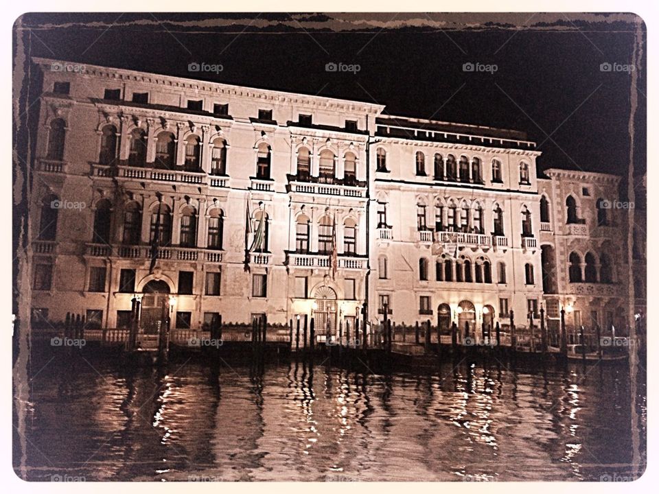 Venice canal buildings at night