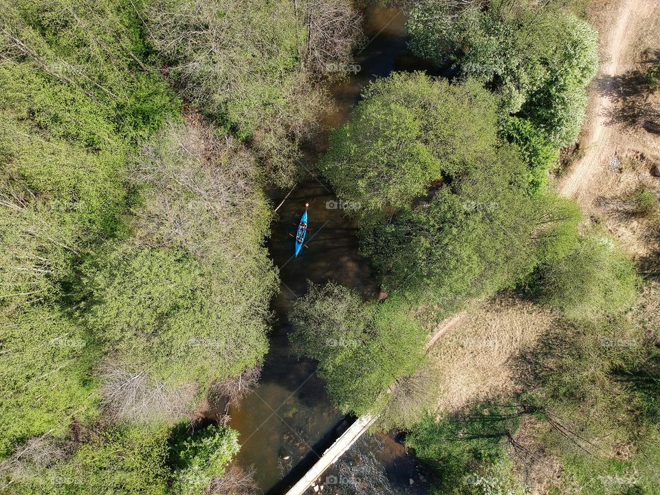 Selfie with drone while swimming with kayaks.