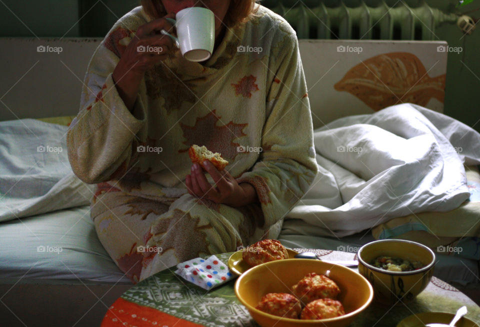 A woman eating breakfast, morning in home