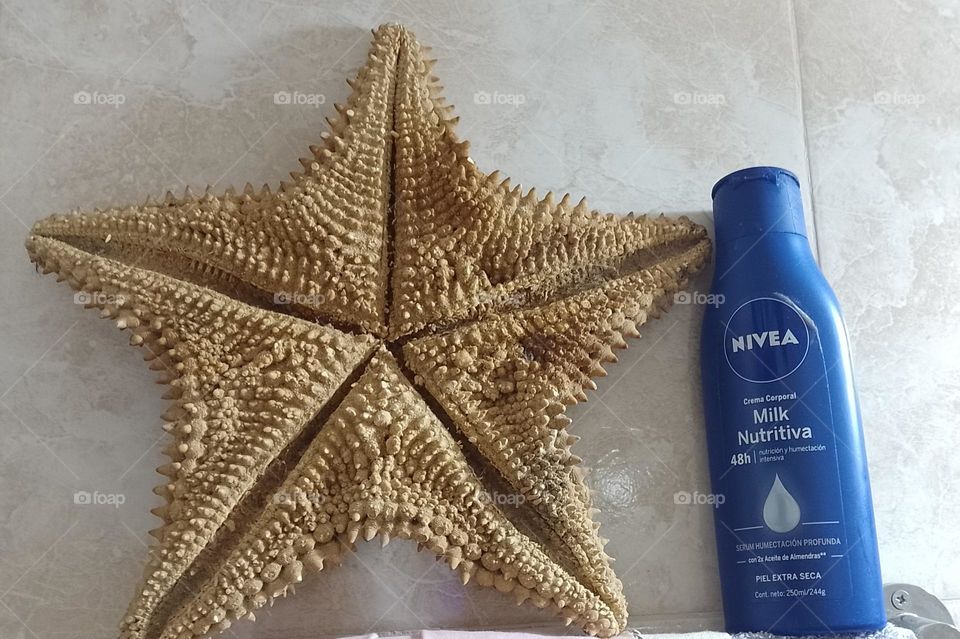 crema Nivea y estrella de mar