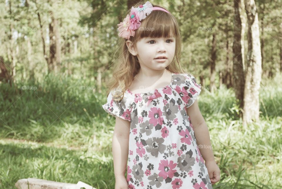 Portrait of a pretty girl in park