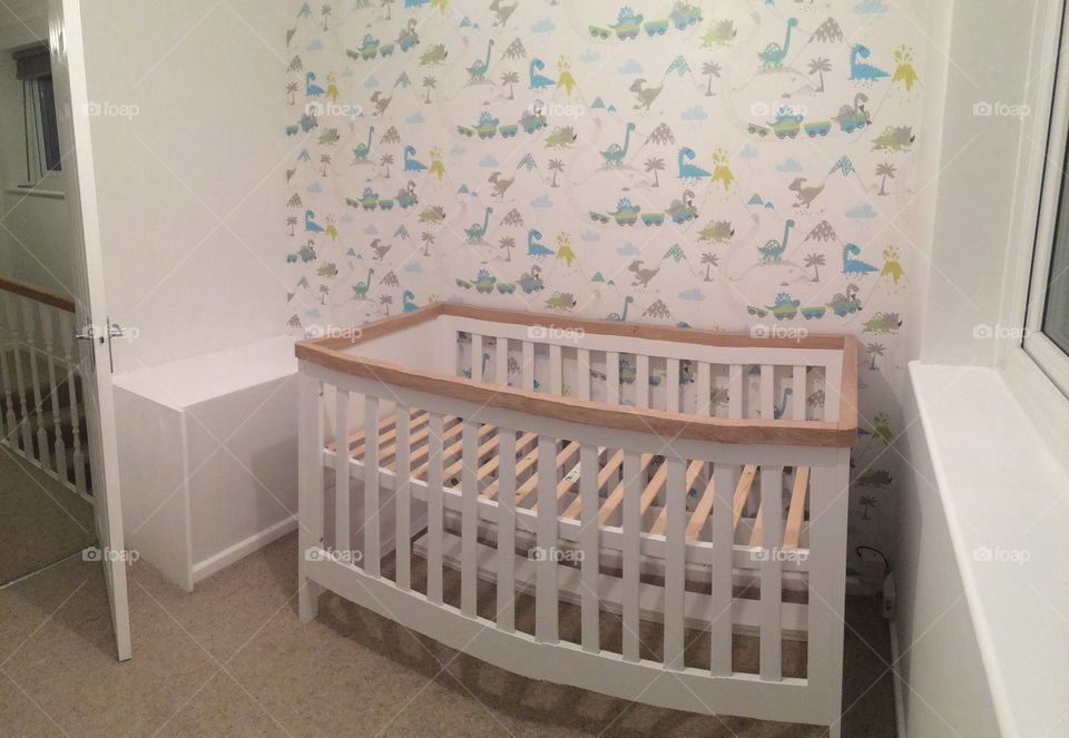Baby nursery room decoration design feature wall wallpaper crib cot bed 