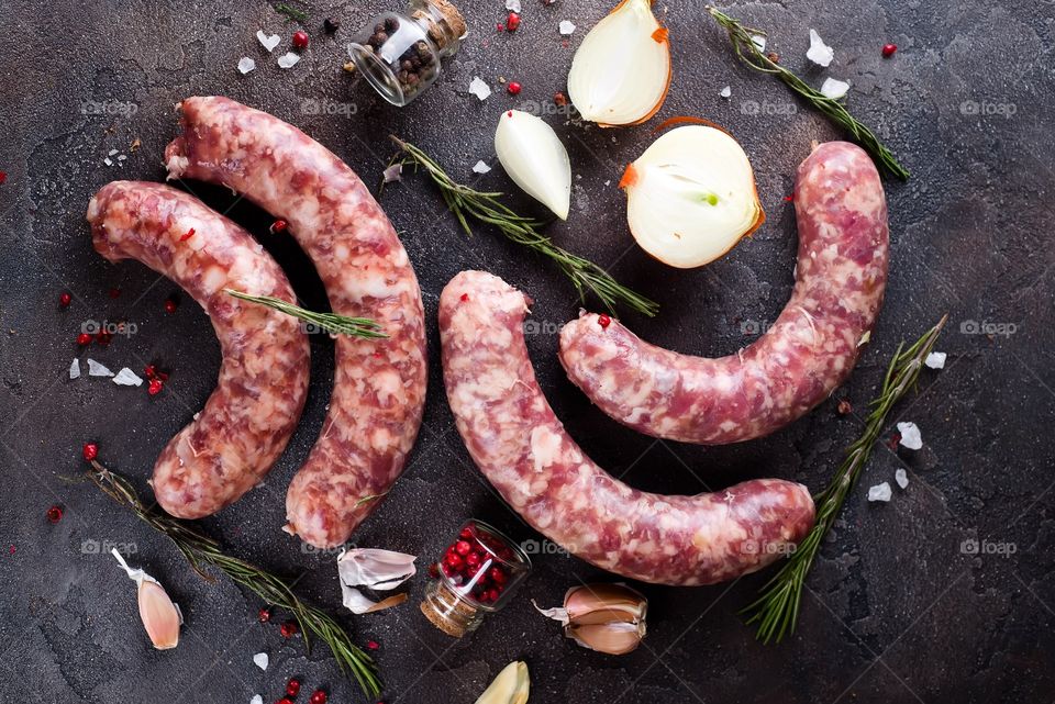 Meat sausage on table with herb 