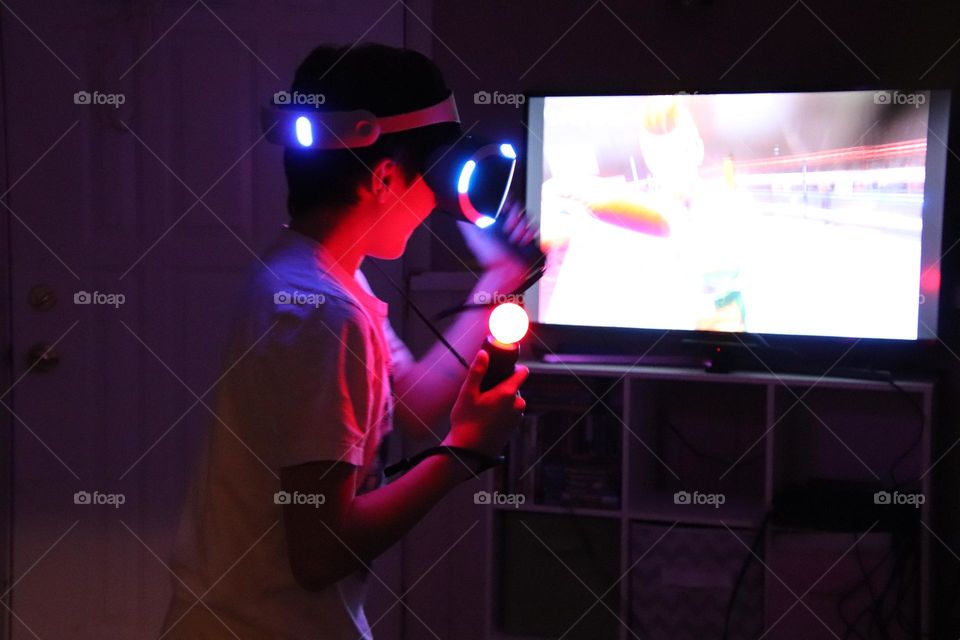 Boy panting virtual video game