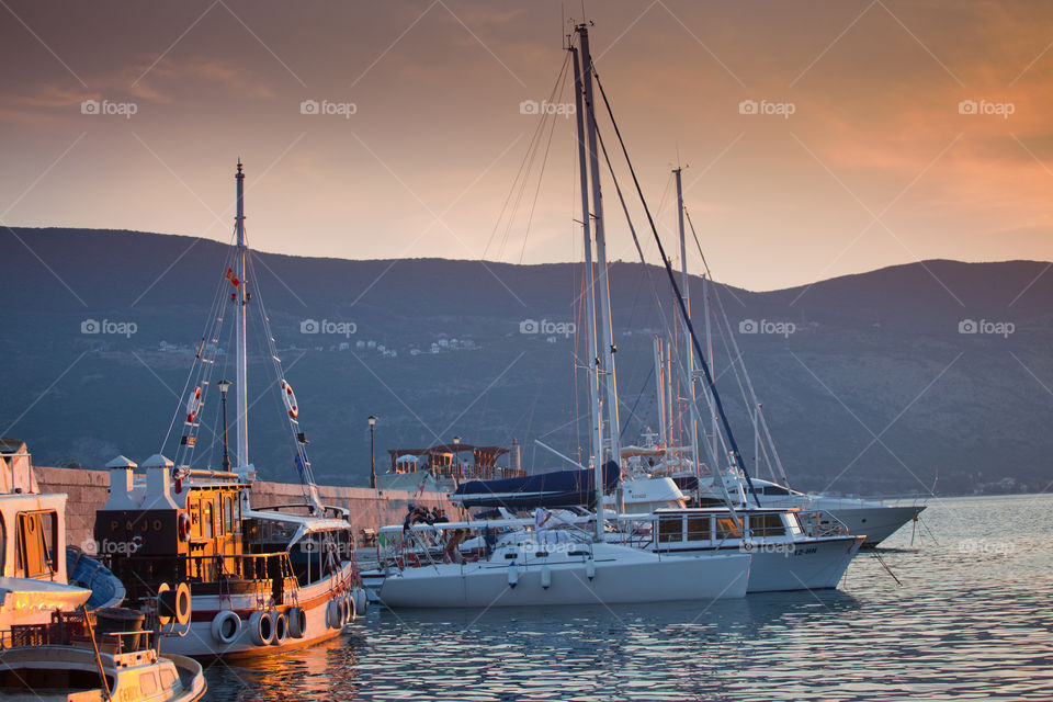 Yachts in Boko Kotor bay at Sunset. Herceg Novi, Montenegro