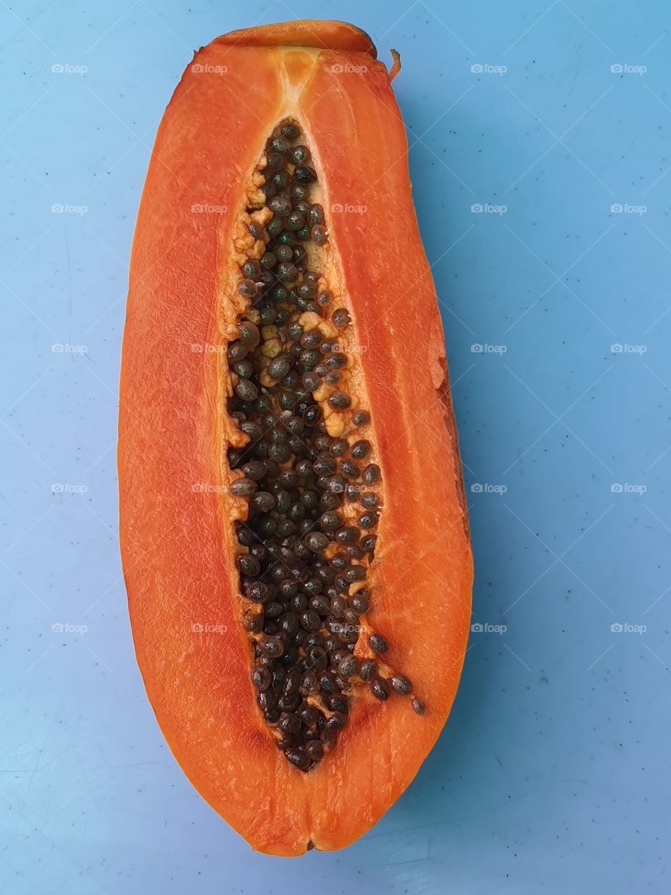 Papaya in orange colour to serve