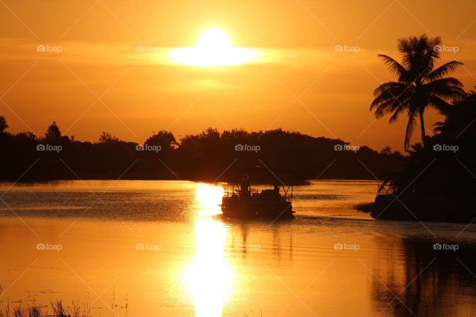 Pontoon boat sunset