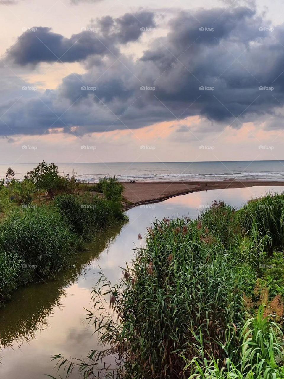 From the side of the river and passing through the green reeds to the calm sea shore in this beautiful area, it reminds me of sweet and unforgettable memories. This is a paradise of fun and beauty.