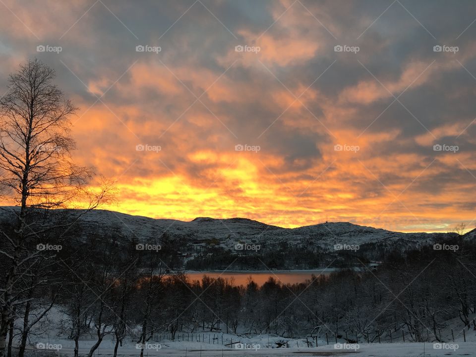 View of snowy mountain during sunset