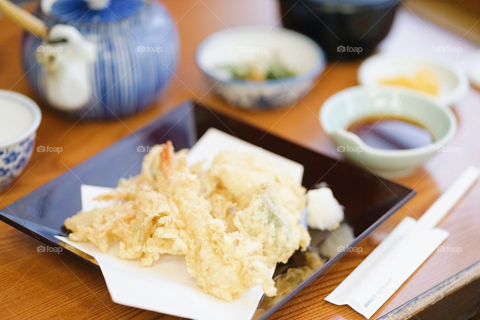 Tempura. Japanese food : tempura or fried shrimp and fried vegetables. Soft focus on the prawn tempura.