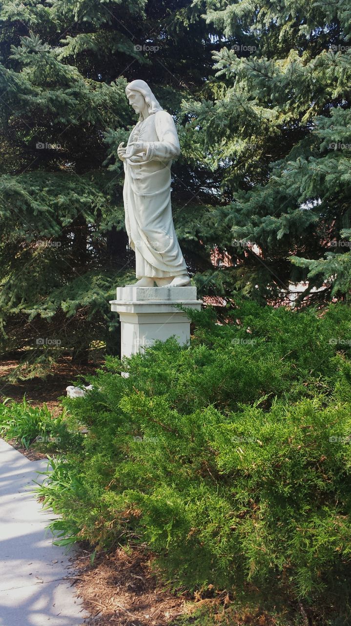 Statue of Jesus in garden