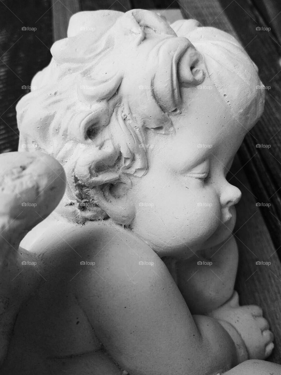 sculpture of a little angel child