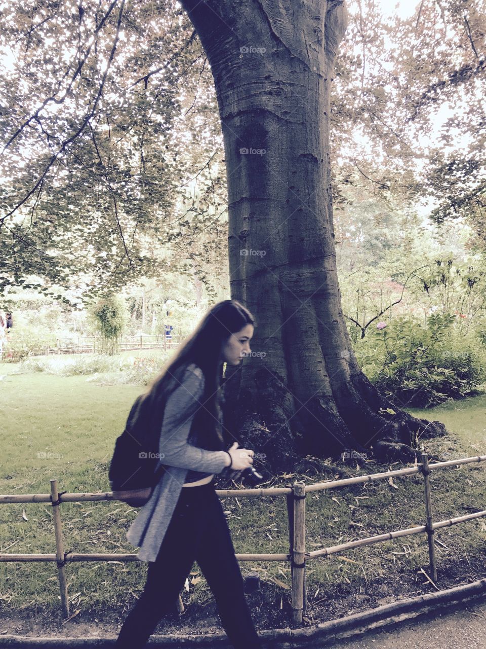 Teenage girl walking in park