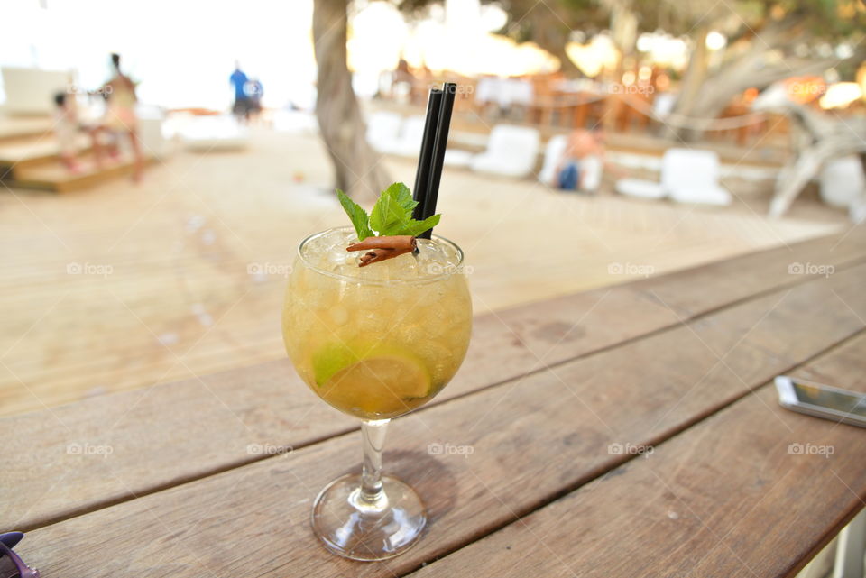 Close-up of mojito on wooden table