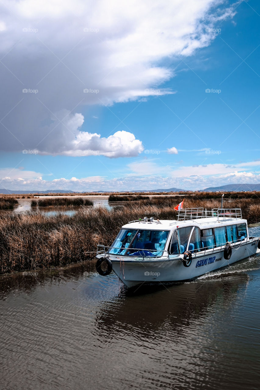 Tourist boat sailing on lake titicaca to tourists