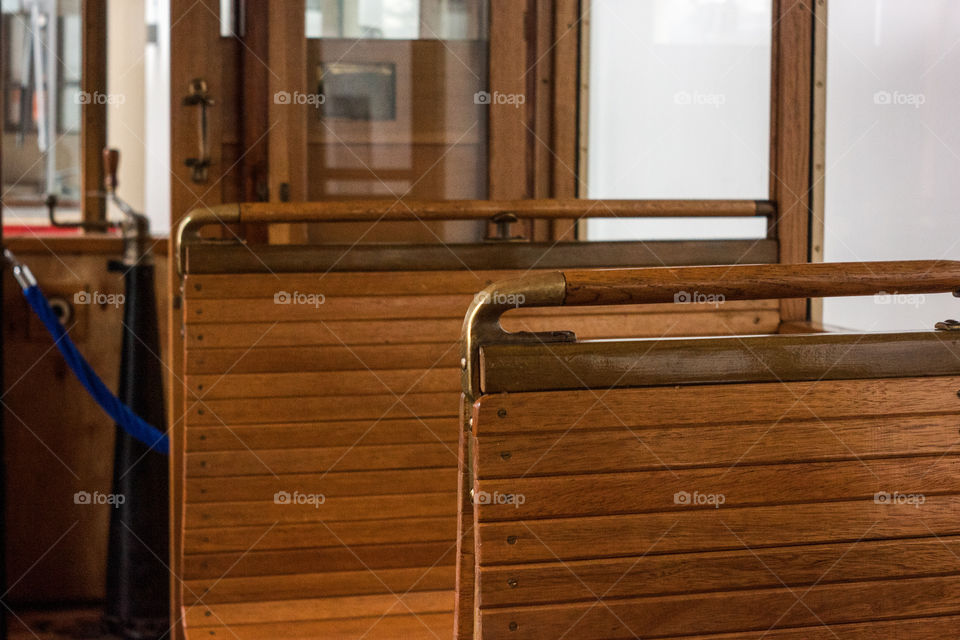 Wooden chairs in the retro tram