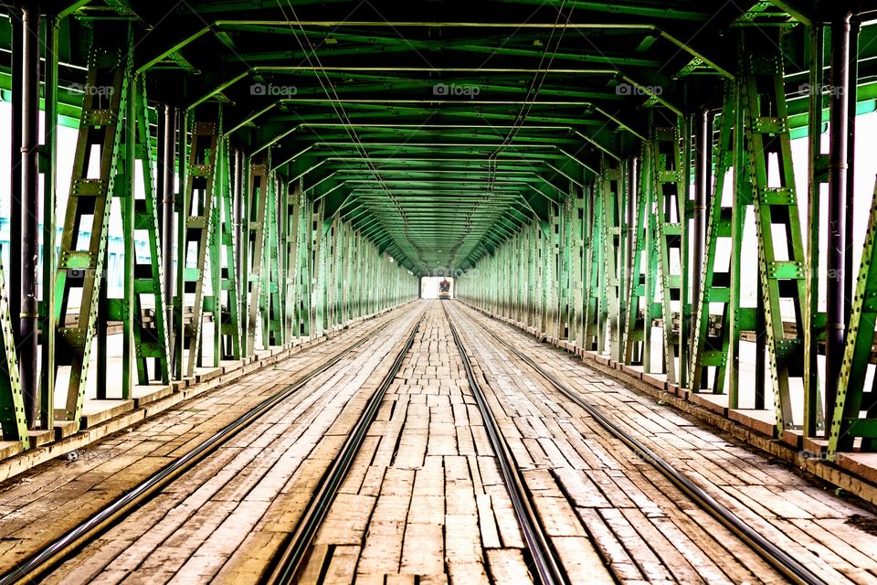 The original two-level bridge in Warsaw was built in Warsaw 1957-59. At its bottom there are tram tracks, pavements and a bicycle path. Poland