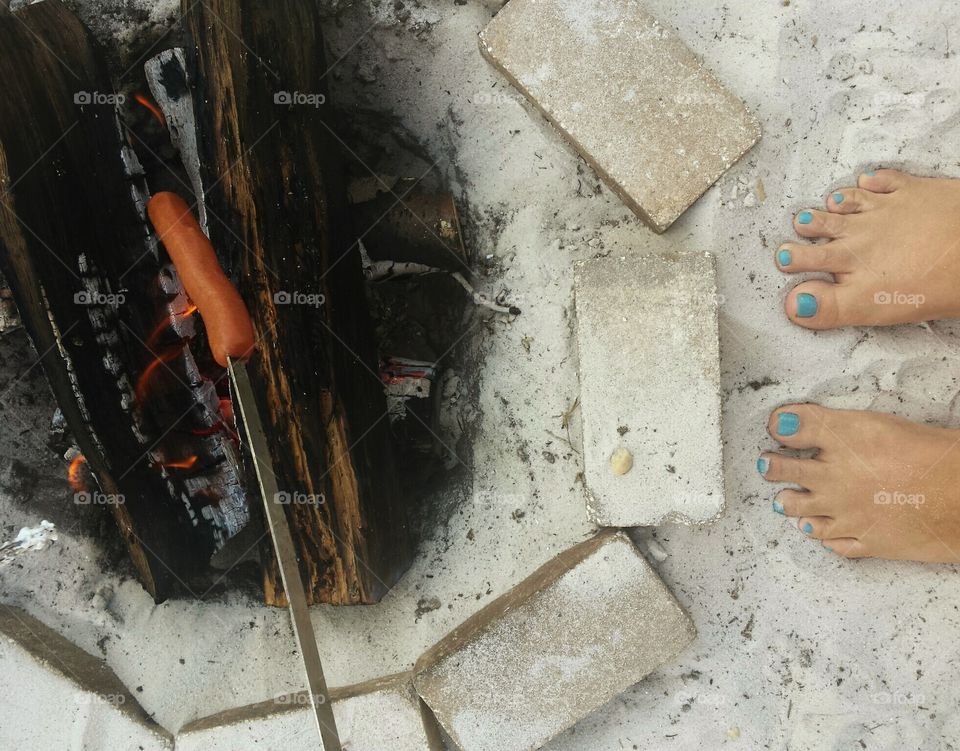 Campfire photo with feet and weiner