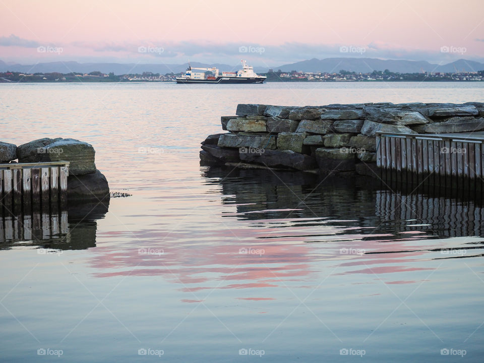 Between the piers. 