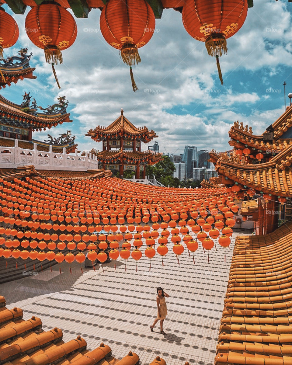 Girl inside Chinese temple in Kuala Lumpur