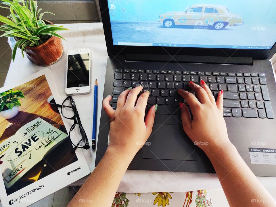 woman working on her laptop at home