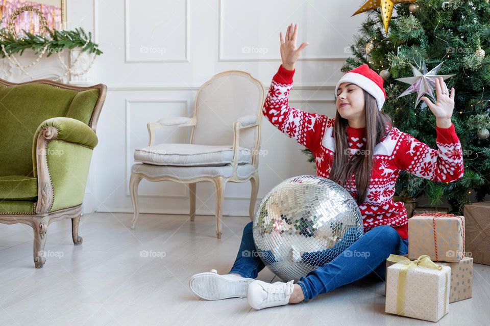 woman holding christmas gifts