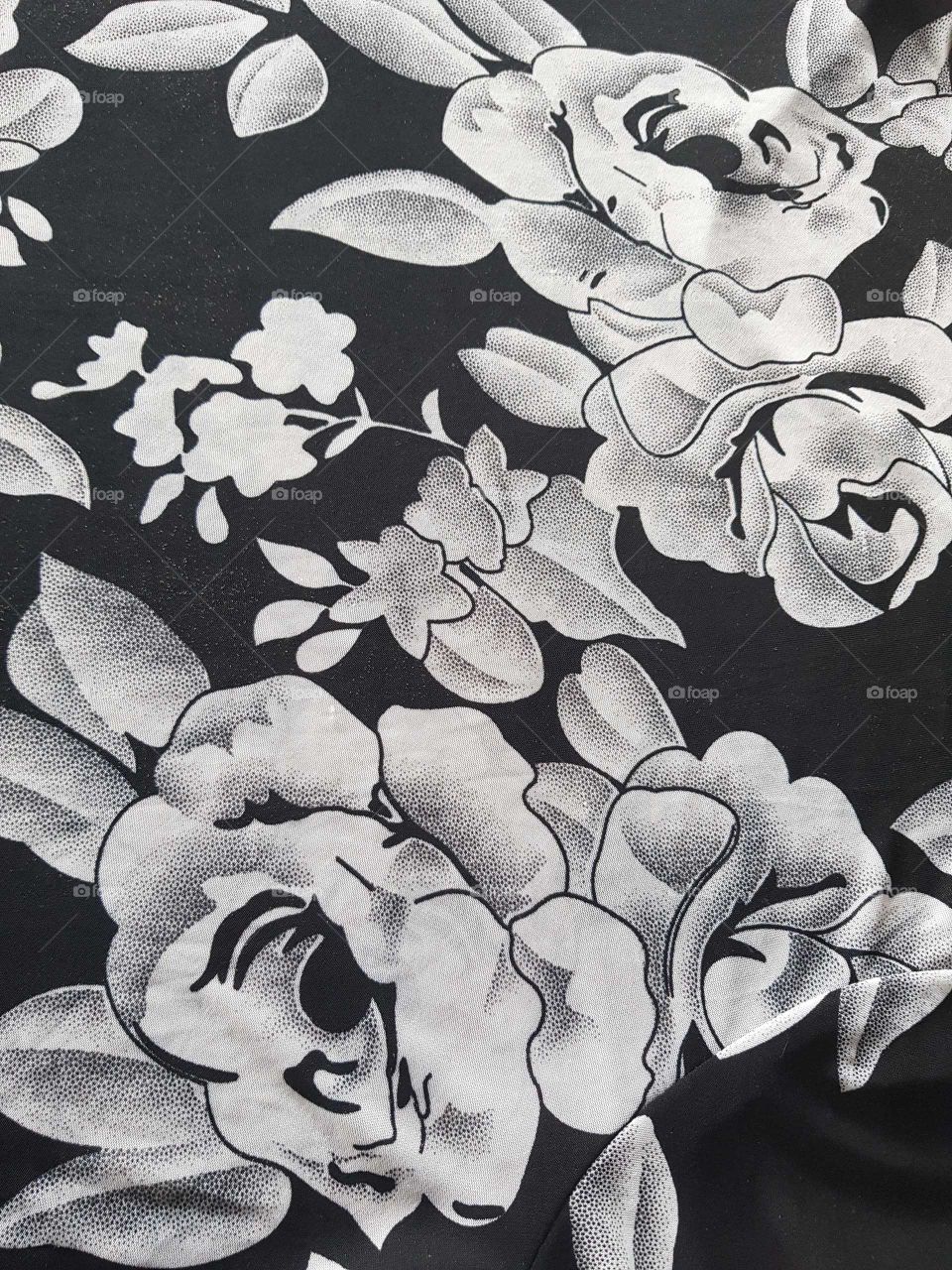 Black and white fabric. Rose's leaves.