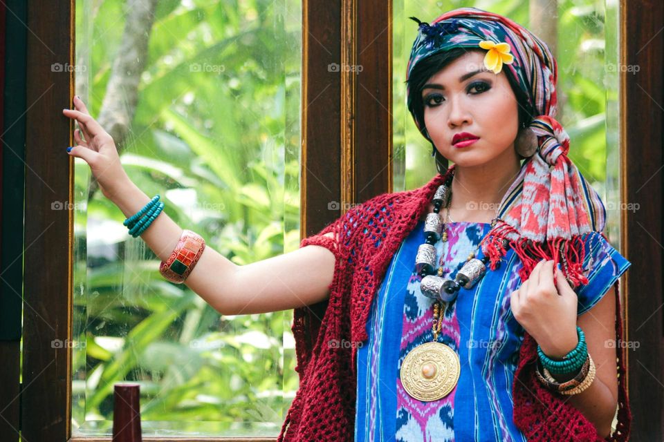 Portrait of a beautiful Asian woman with a happy smiling expression.