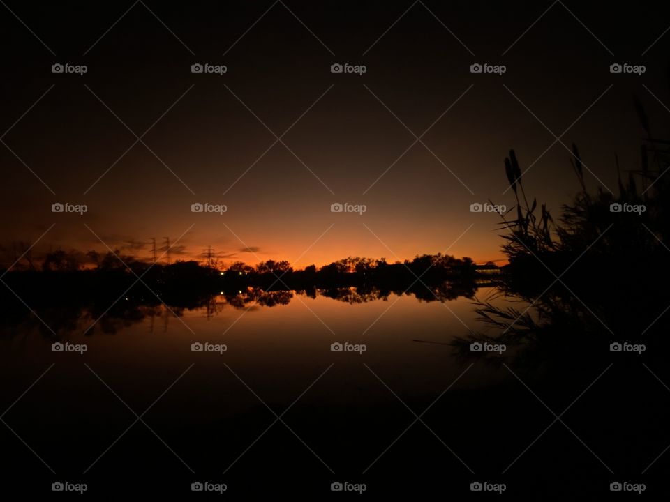 Low light no zoom makes the reflections from the water pop for brightness into the Night