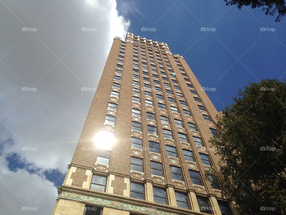 The sun reflects of a building in downtown San Antonio 