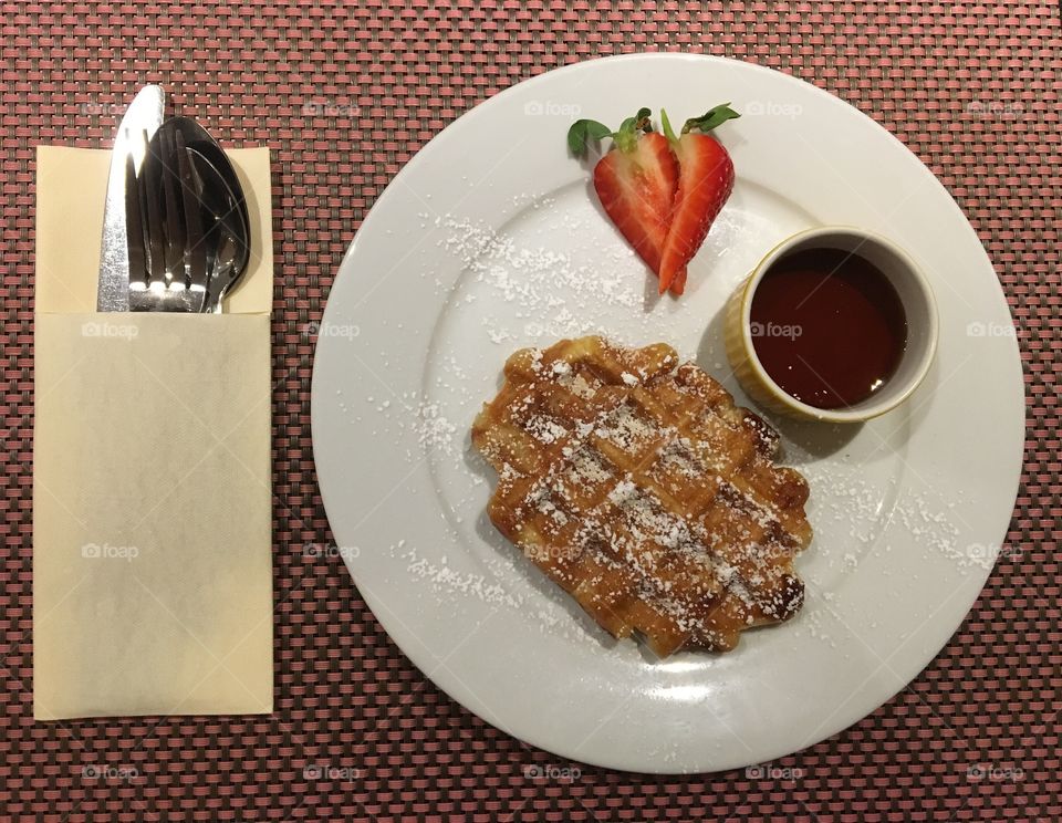 Brits eat waffles too with sliced strawberry and maple syrup ...