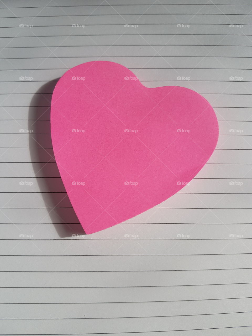 heart shaped pink post it