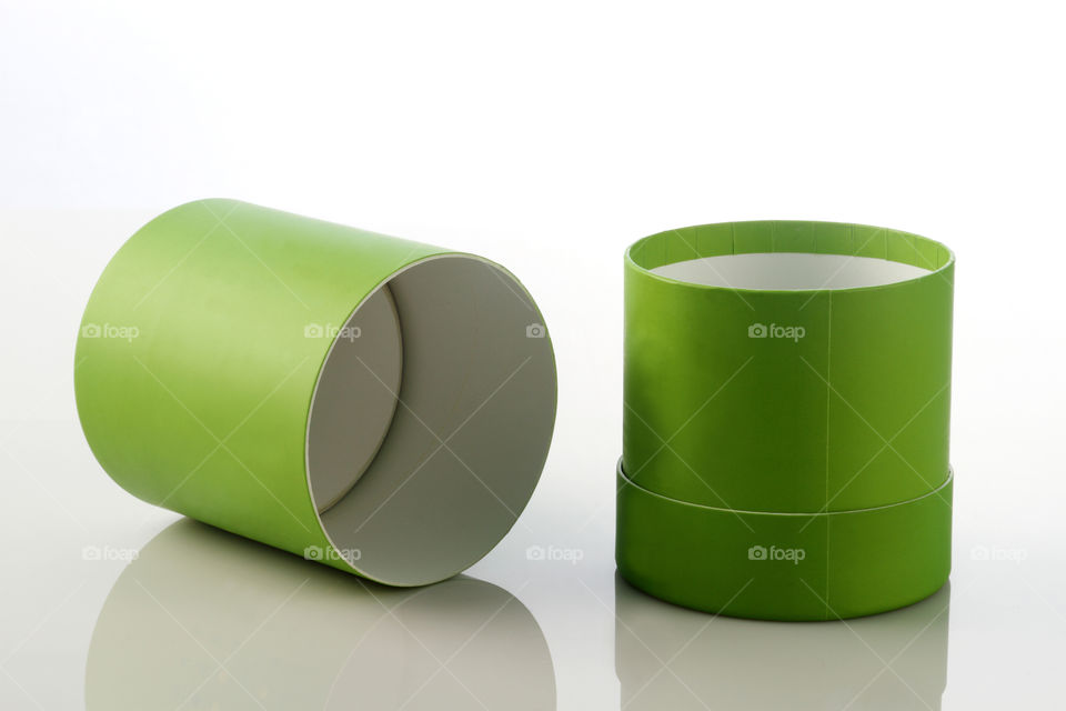 Open green cylinder card board box for packaging mockup