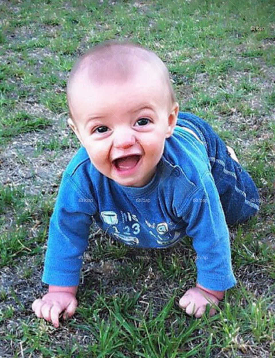 Let loose in the backyard and loving it. He takes off across the lawn with surprising speed until his escape is foiled.