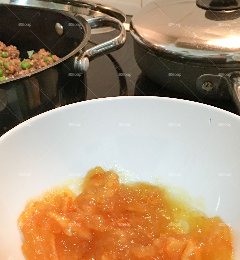 What's cooking? Homemade marmalade in preparation as a glaze for orange chicken