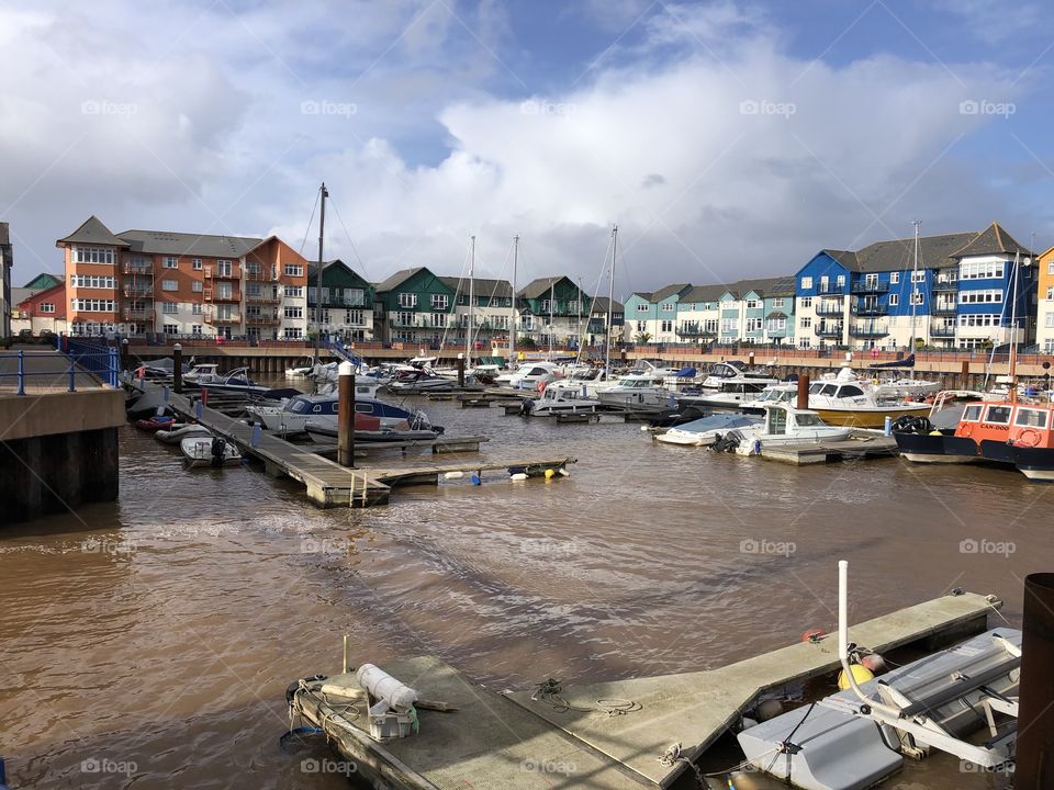 Exmouth Harbour with it’s modern apartments and beautiful watercraft on a very cold February 2020, but at least sunny day.
