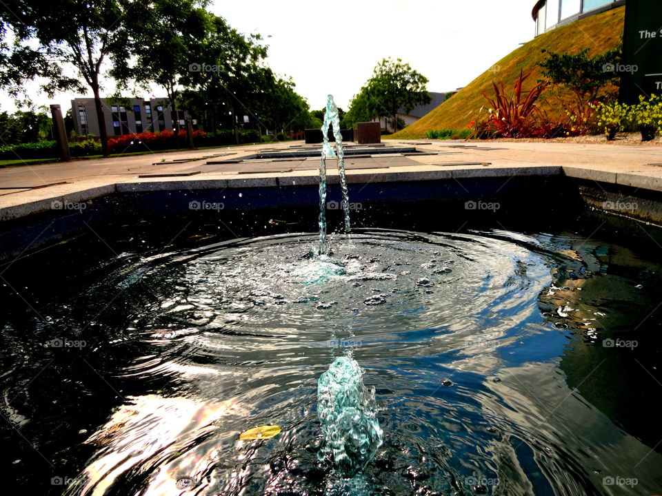 fountain with reflexion. fountains in the Jubilee Campus, University of Nottingham