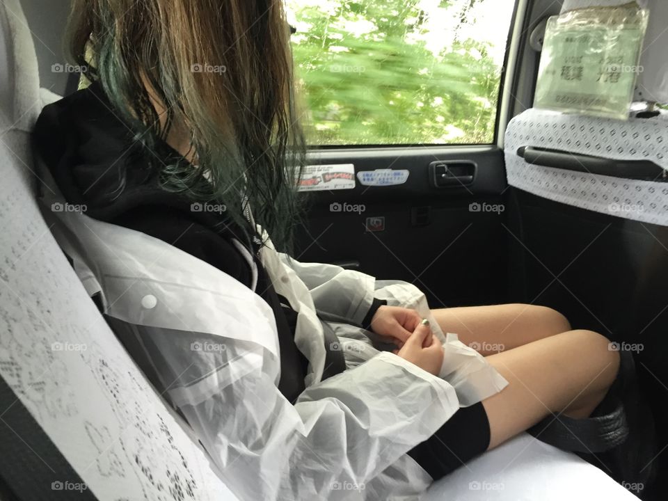 A girl in taxi  in okayama, Japan