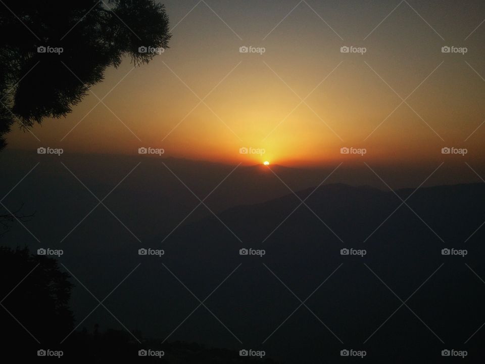 sun rising behind those mountains...at beautiful Darjeeling