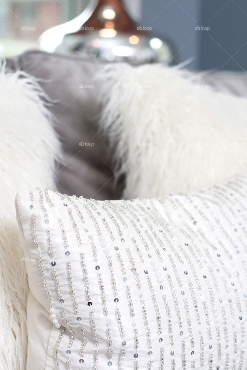 White jeweled pillow