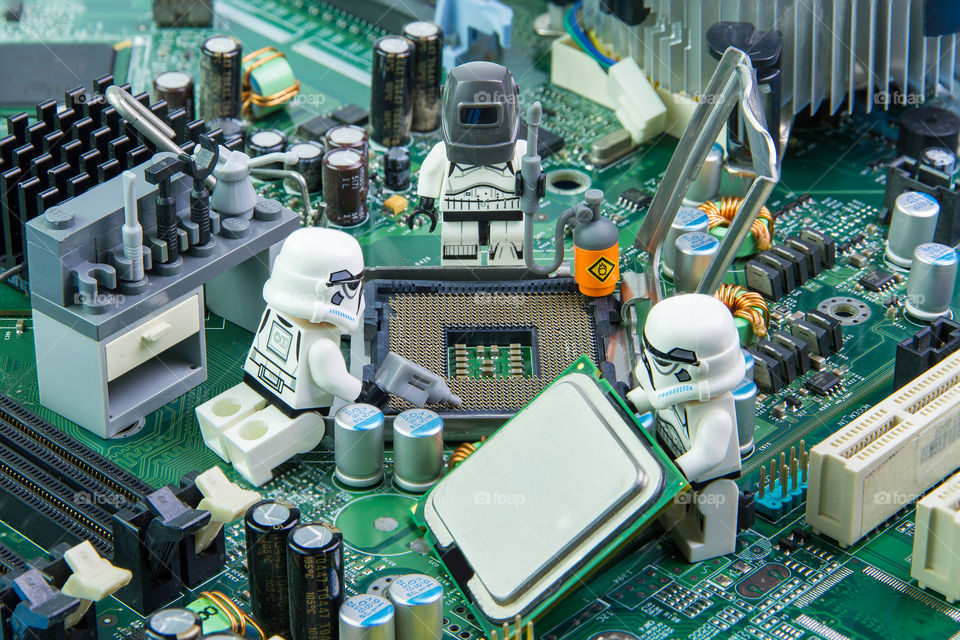 Nonthabure, Thailand - August, 02, 2016: Lego star wars repairing computer motherboard.The lego Star Wars mini figures from movie series.Lego is an interlocking brick system collected around the world.