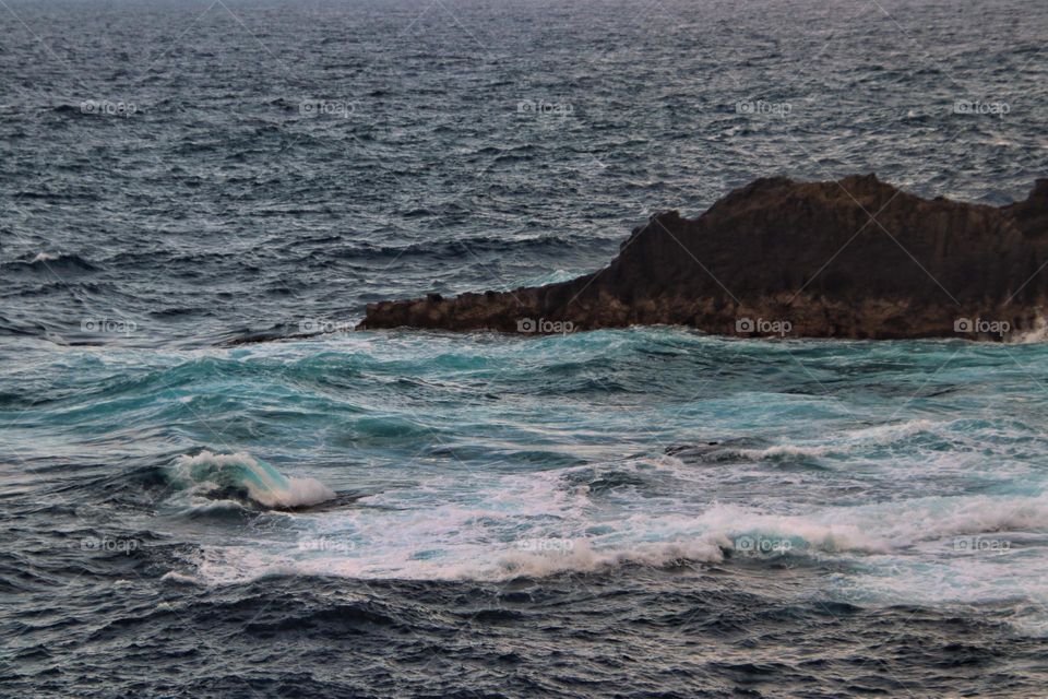 View over the rough green atlantic ocean and cliffs 