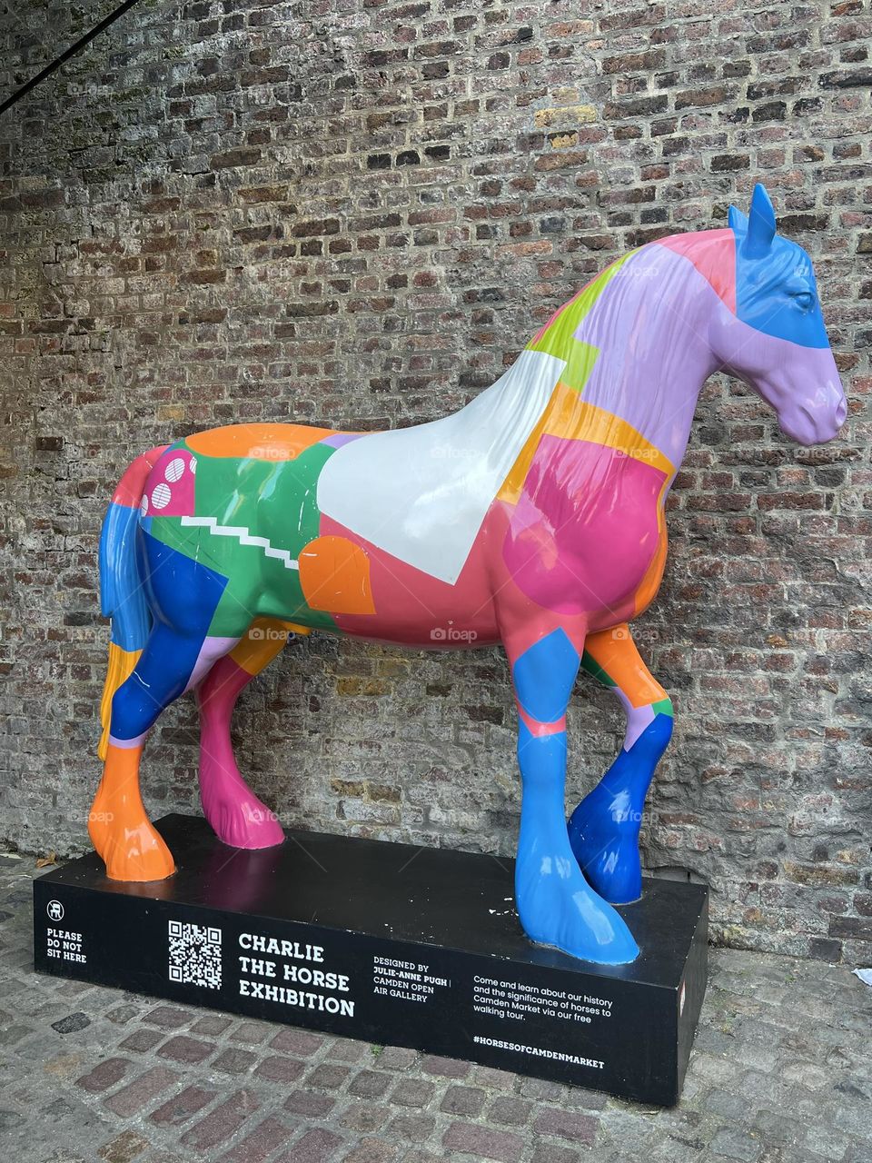 Colourful horse, beautiful street art. London, Camden Town. Sculpture.