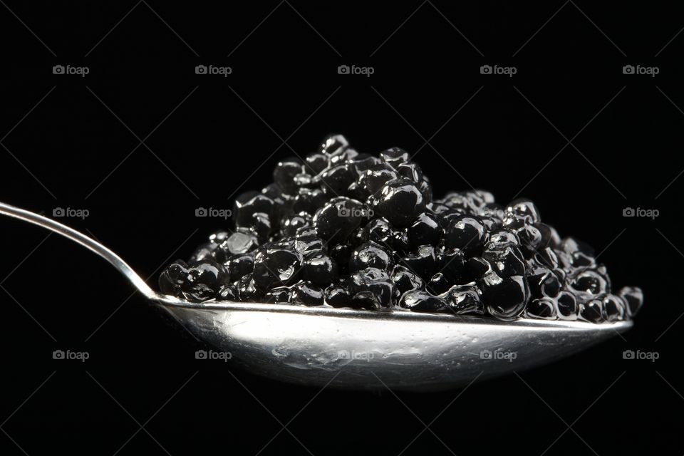 Spoon with delicious, elegant caviar