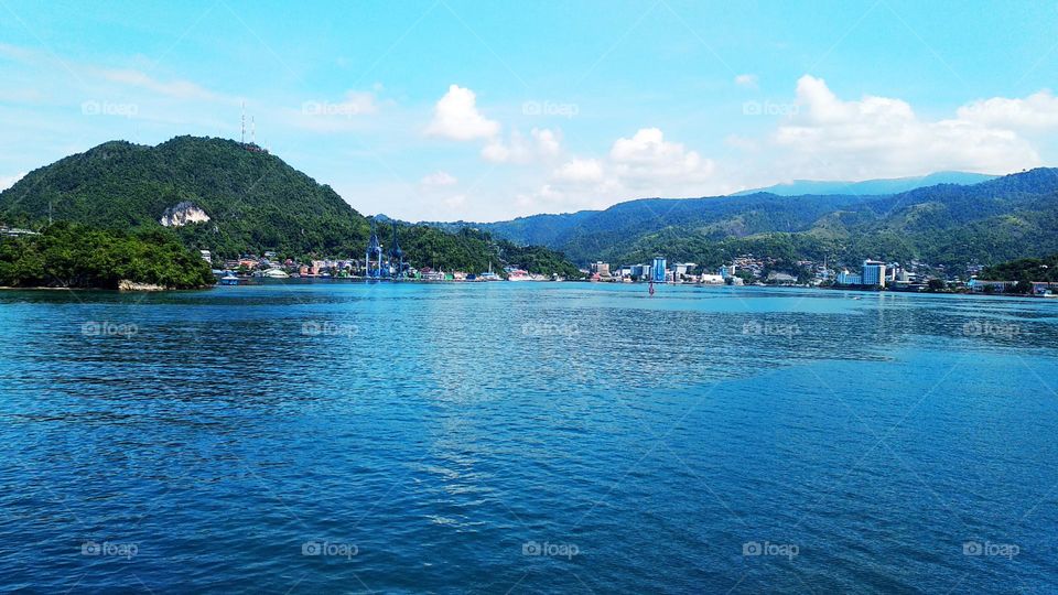 Beautiful landscape, view of Jayapura City seen from the sea, the beauty of eastern Indonesia.