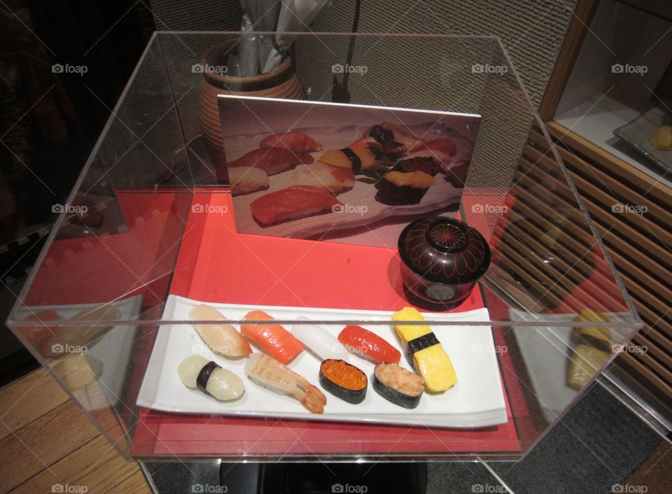 Sushi Display Outside Restaurant in Tokyo Station, Japan.  3D Menu at Entrance of Restaurant in Train Station