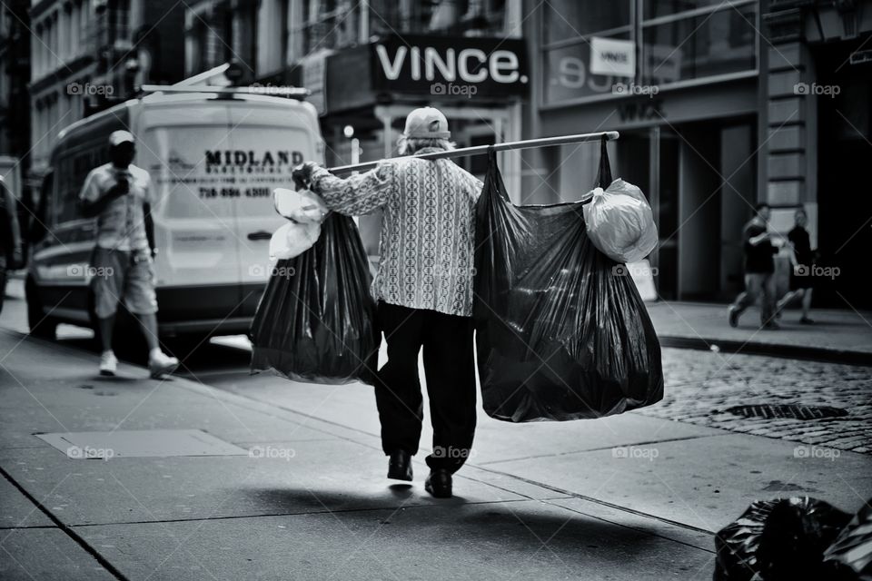 One mans trash . Busy soho street 