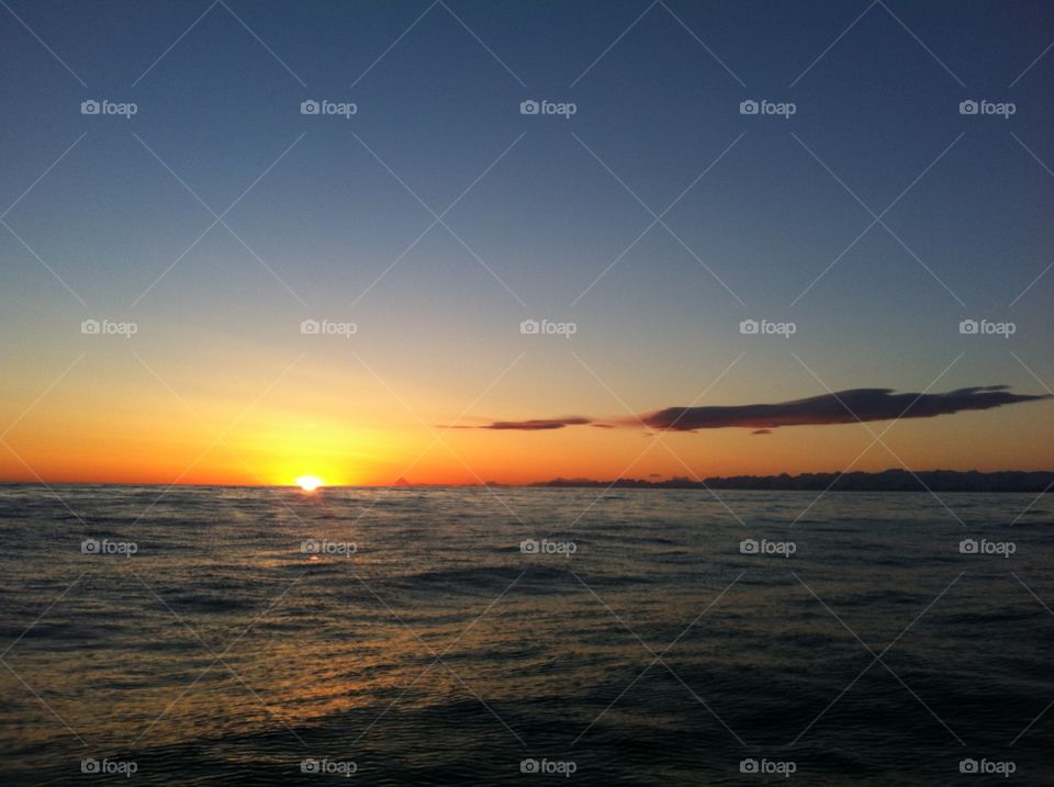 Long Night Ahead. Sunset while sailing Inside Passage Alaska. No towns or coves nearby for days. On our own. 